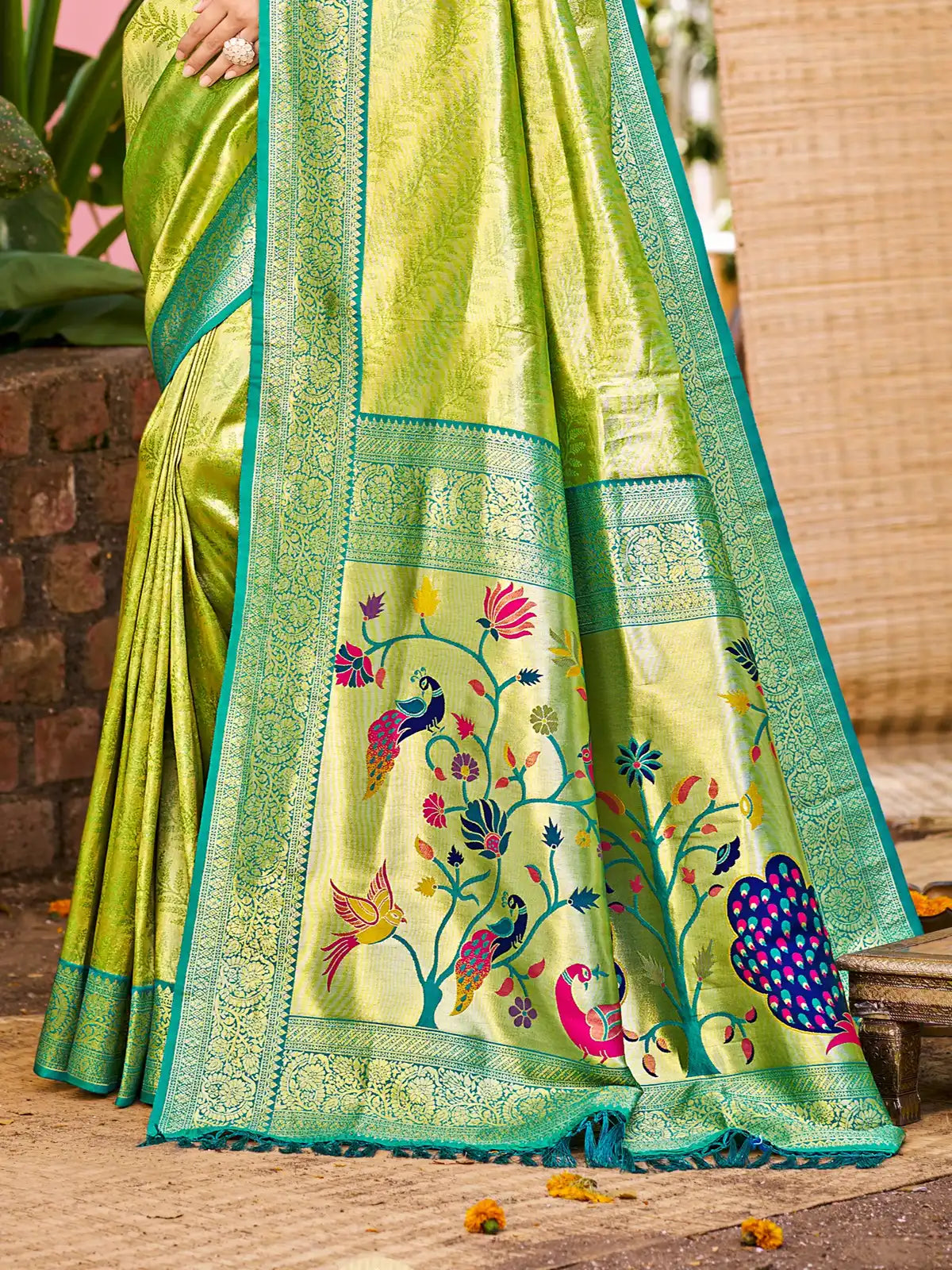 Tarani green Kanjivaram silk saree pallu close-up with intricate woven detailing