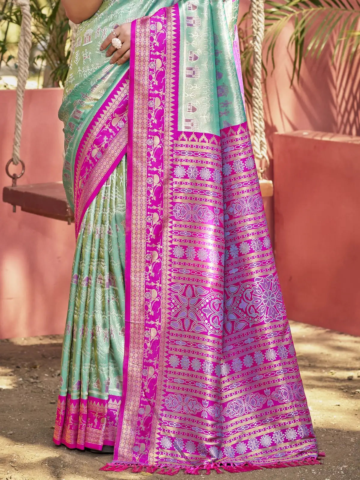 Tarani kanjivaram silk saree pallu view highlighting woven motifs and border