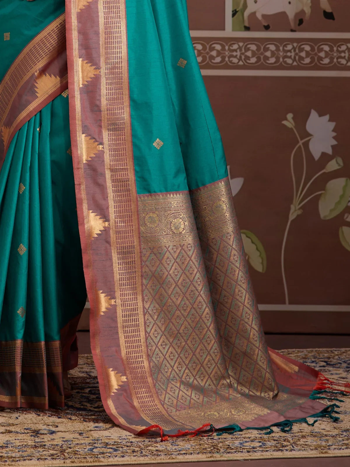 Tarani silk saree closeup showing rich gold zari pallu design