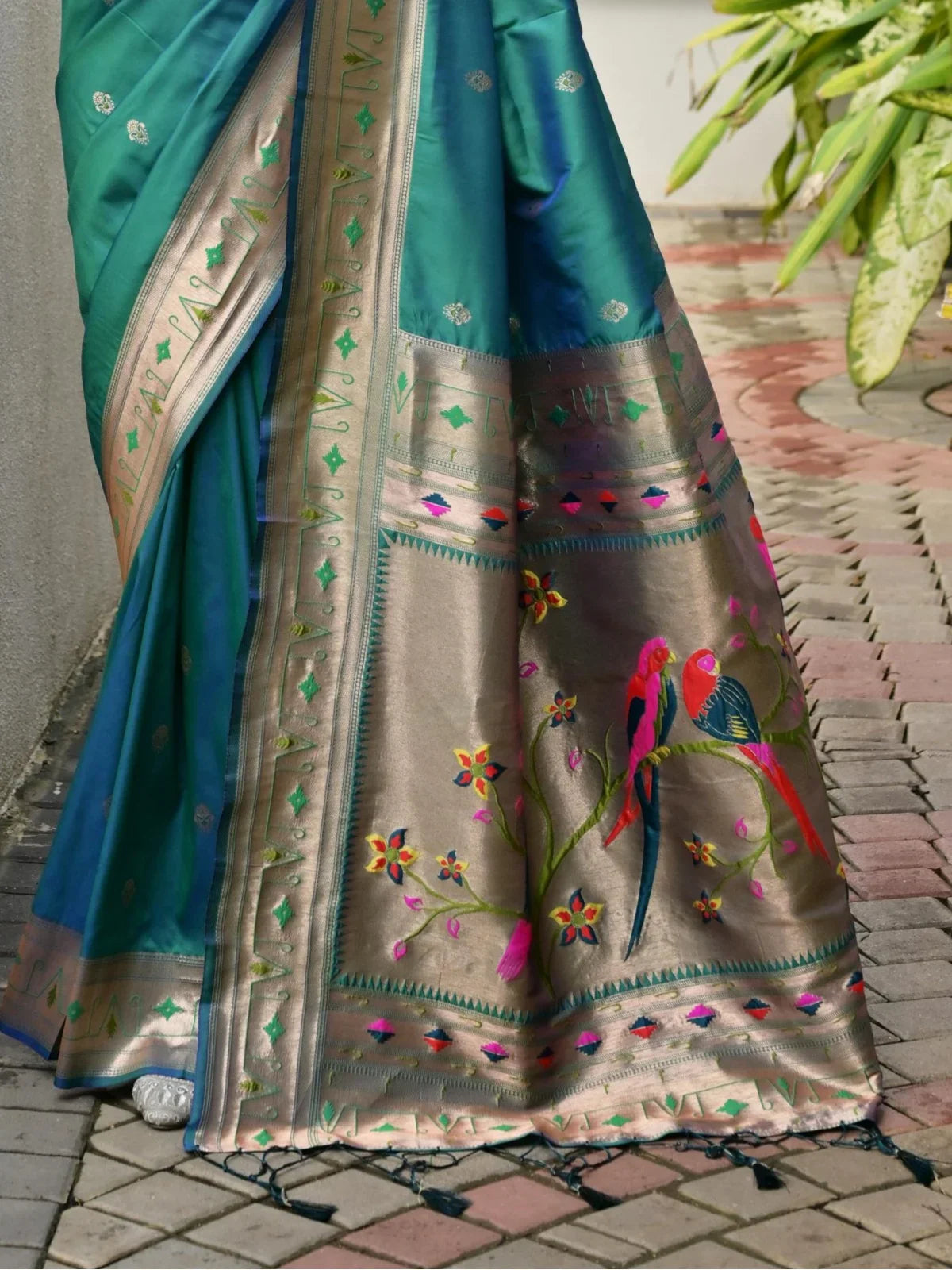 Tarani paithani saree pallu with colorful parrot motifs and intricate zari work