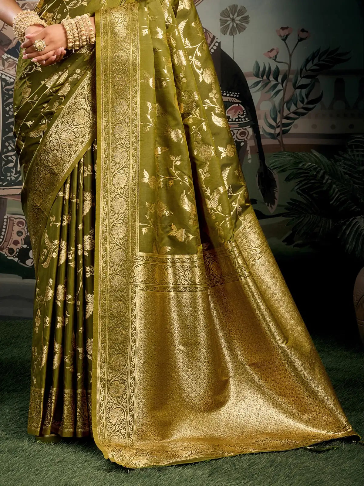 Tarani green silk saree closeup view with zari detailing
