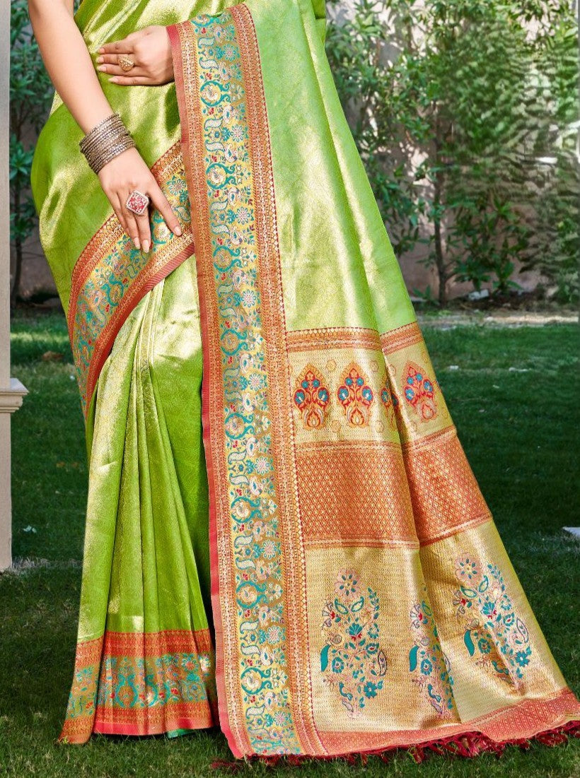 Tarani premium green kanjivaram silk saree pallu view showcasing zari details