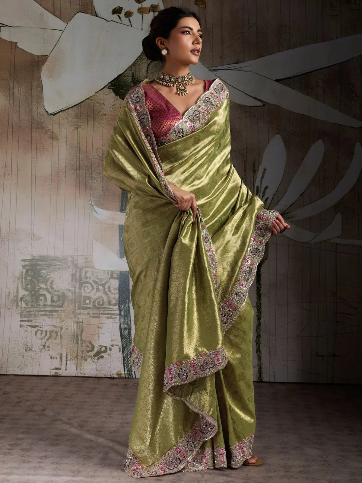 Tarani olive green Banarasi jacquard silk saree side view highlighting elegant drape