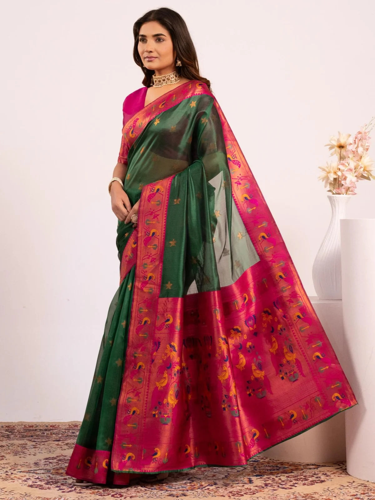 Tarani premium green soft tissue silk Paithani saree with zari woven border side-view
