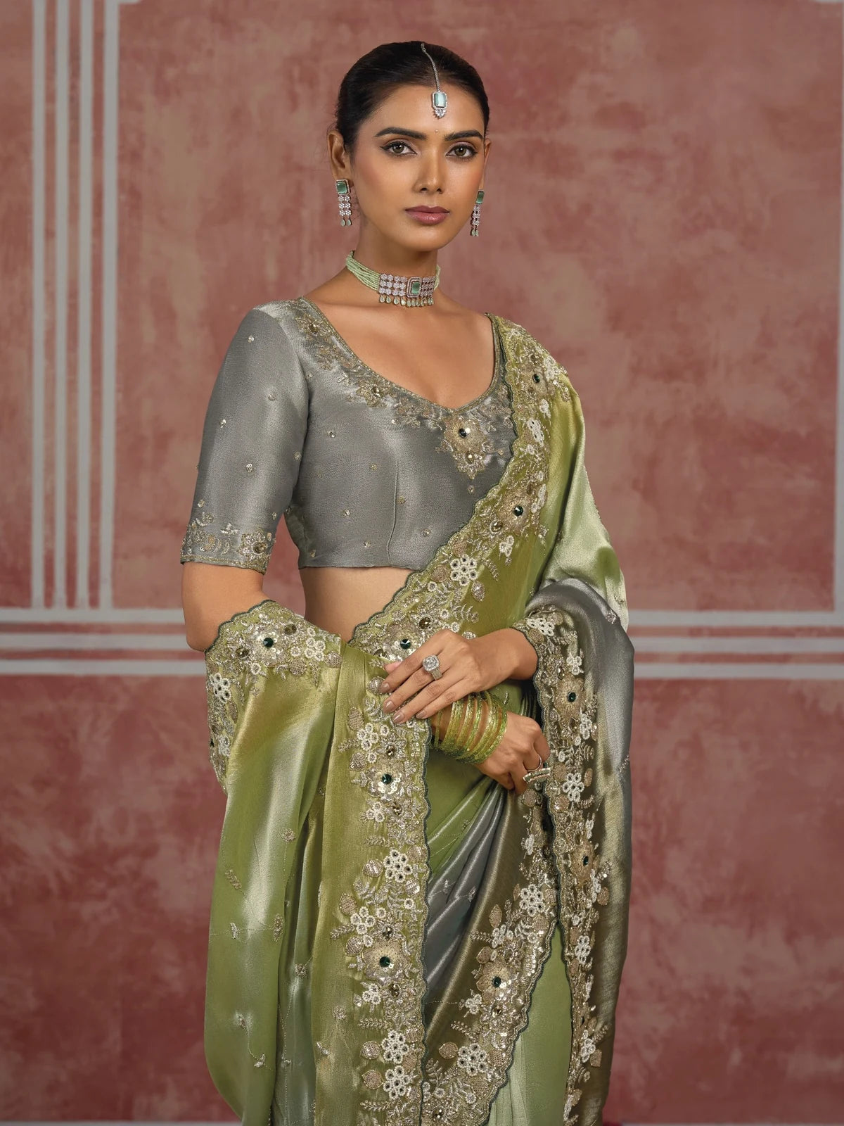 Tarani green Pure Ziraf Silk saree upper body view highlighting blouse and embroidered border