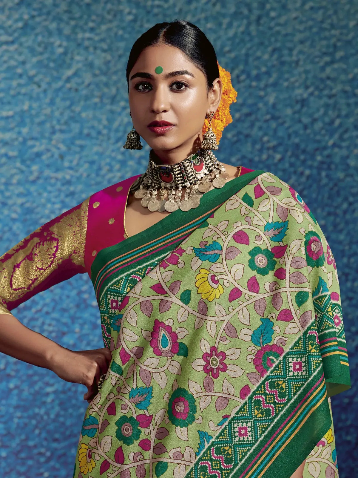 Tarani festive tusser silk saree in green with kalamkari and patola pallu upper body view