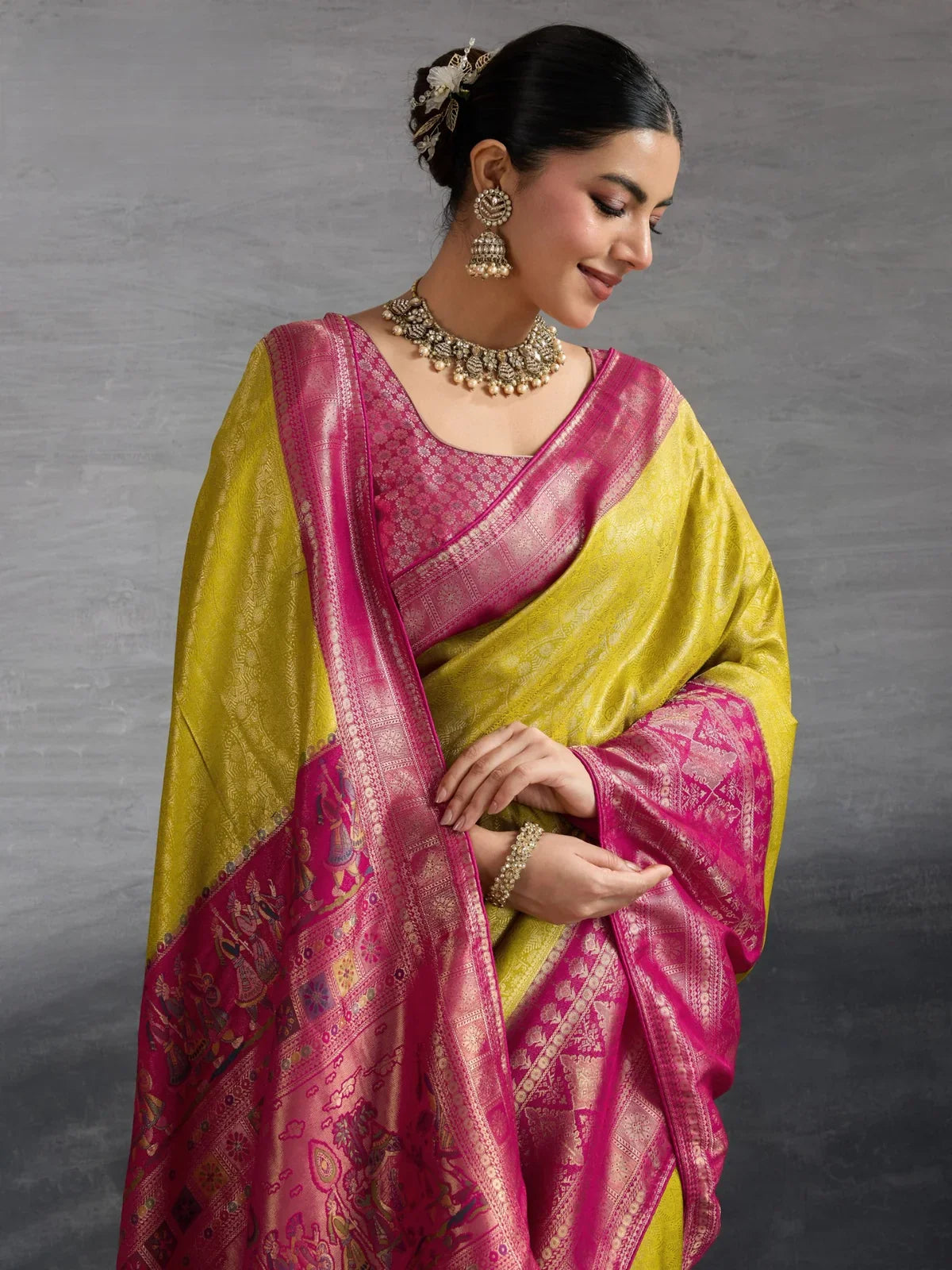 Tarani green kanjivaram saree with pink blouse and antique jewellery close upper-body view