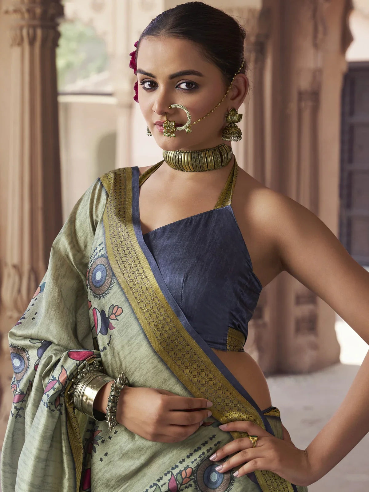 Tarani green silk saree upper body view showing blouse and jewelry styling