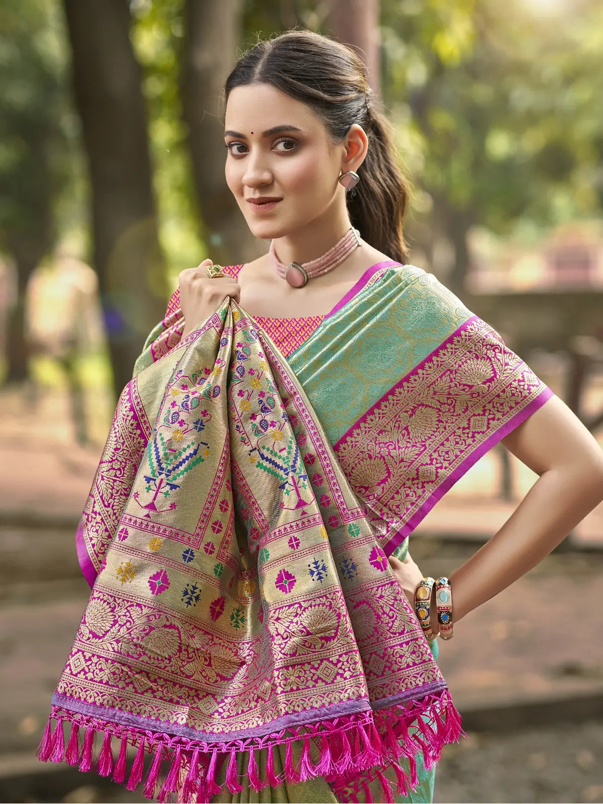 Tarani green silk saree with pink woven blouse design upper body view