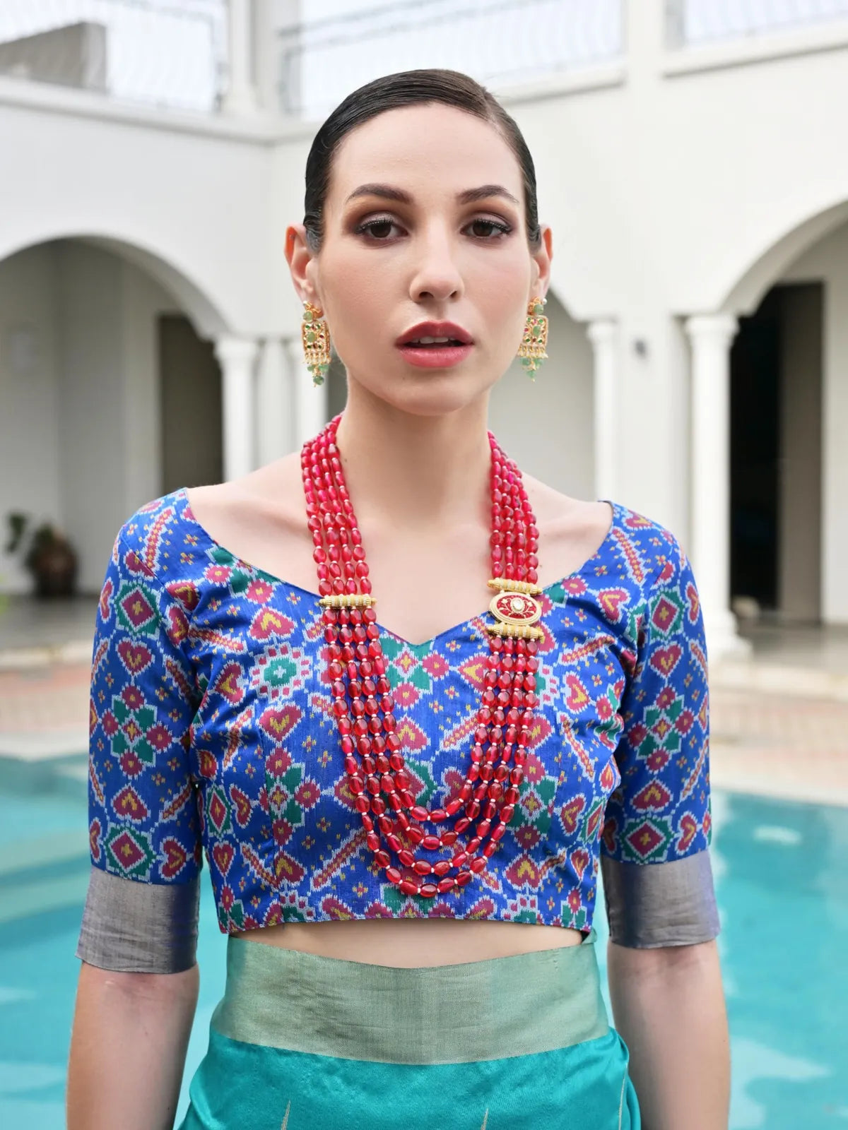 Tarani festive green saree with ikkat blouse close-up front view