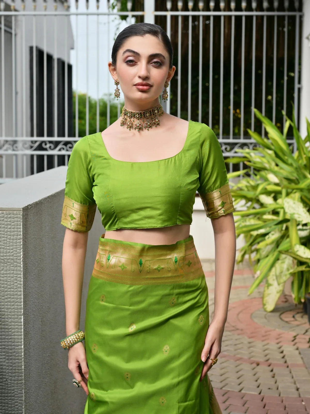 Tarani green saree upper body view with elegant blouse and sleeve border details