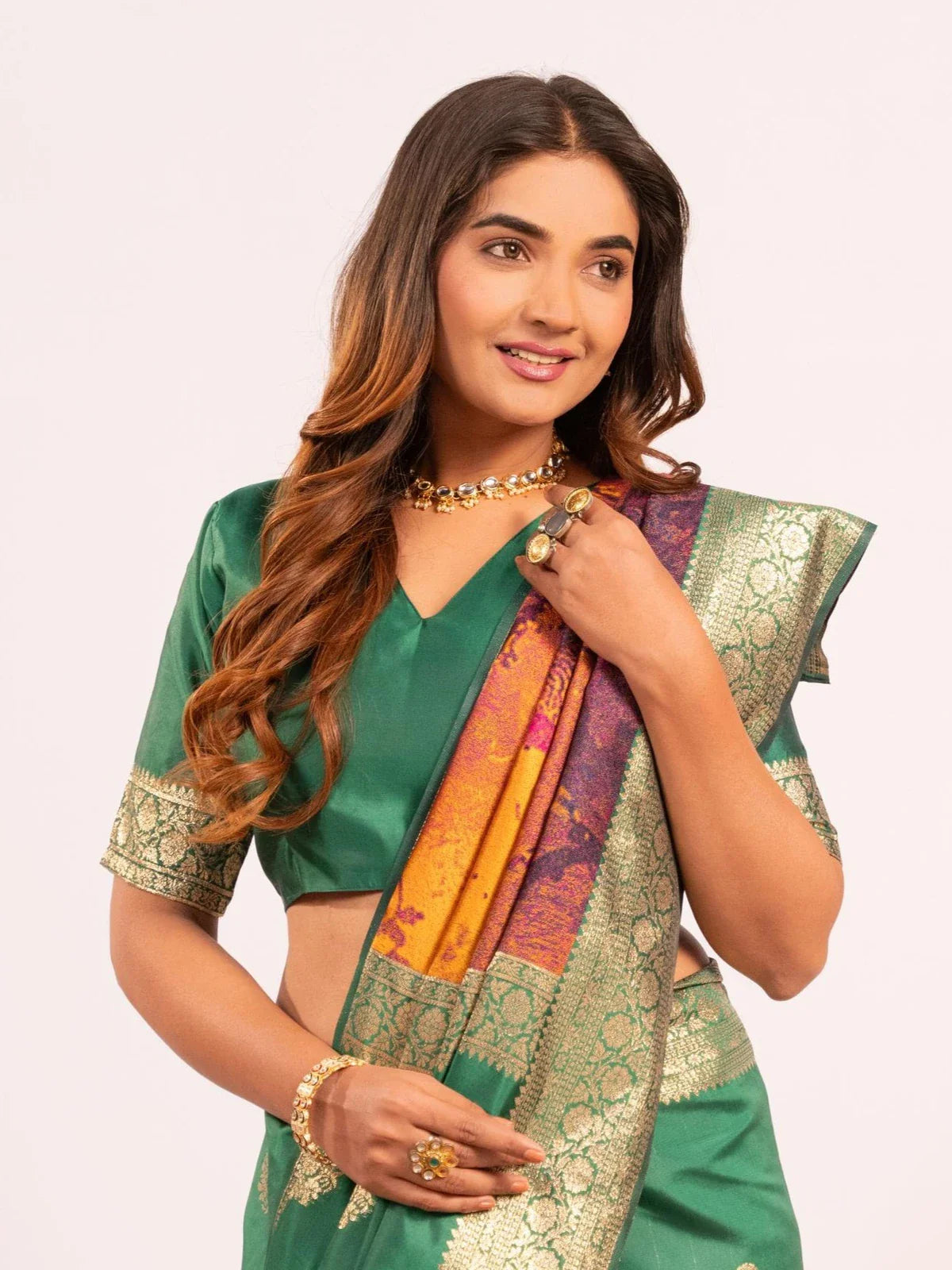 Tarani green silk saree upper body view with intricate blouse and festive jewellery