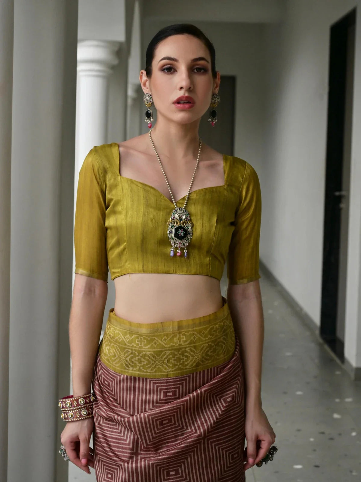 Tarani tussar silk saree with mustard blouse and antique jewellery - upper body front pose