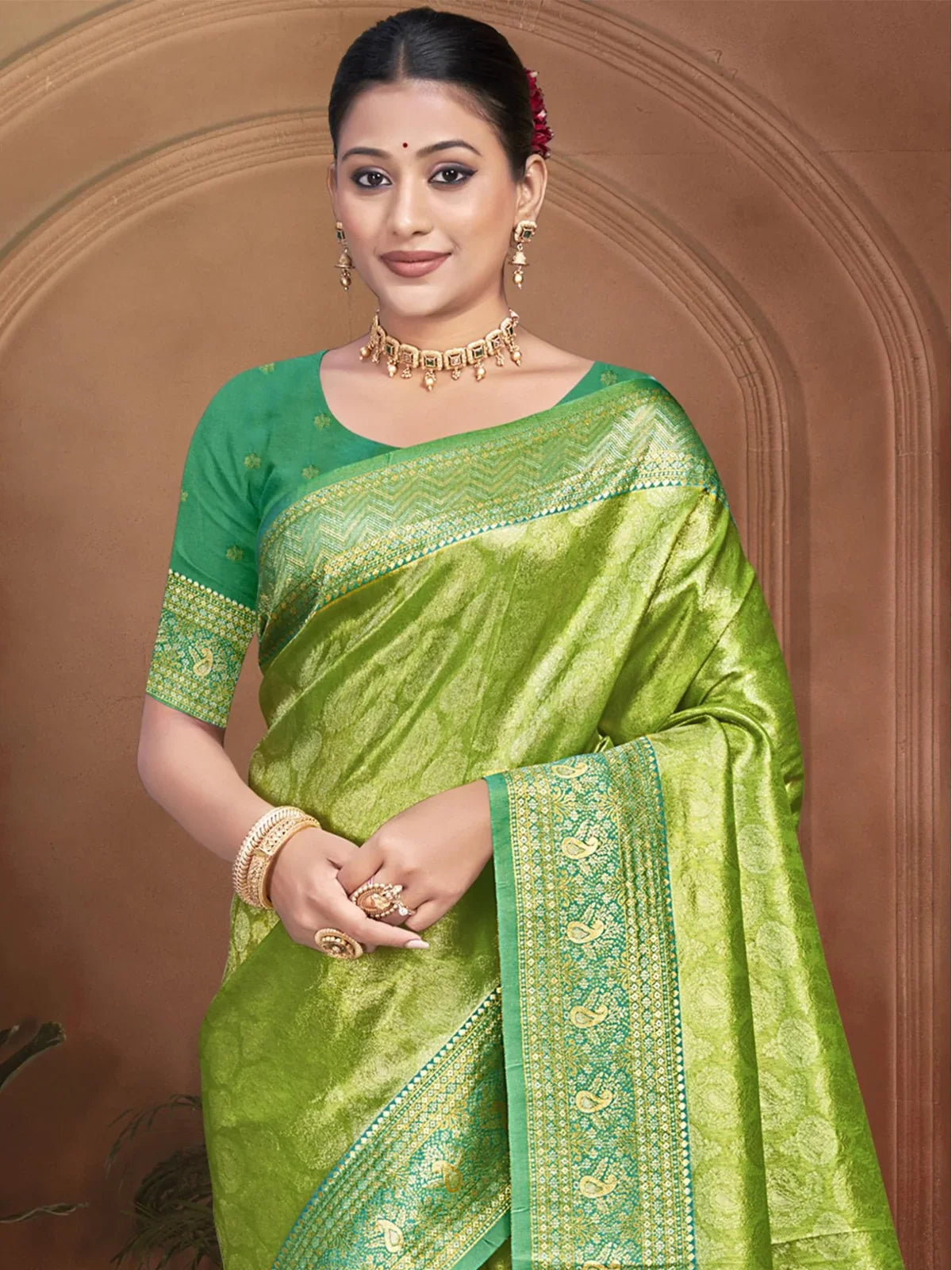 Tarani green kanjivaram silk saree upper body view showing blouse and intricate pallu design
