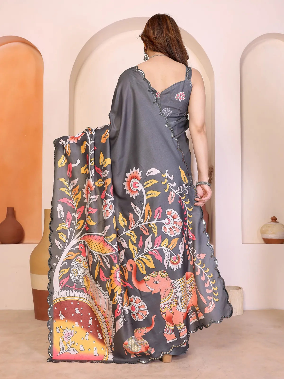 Tarani Manipuri silk saree from back showing full kalamkari artwork and fall