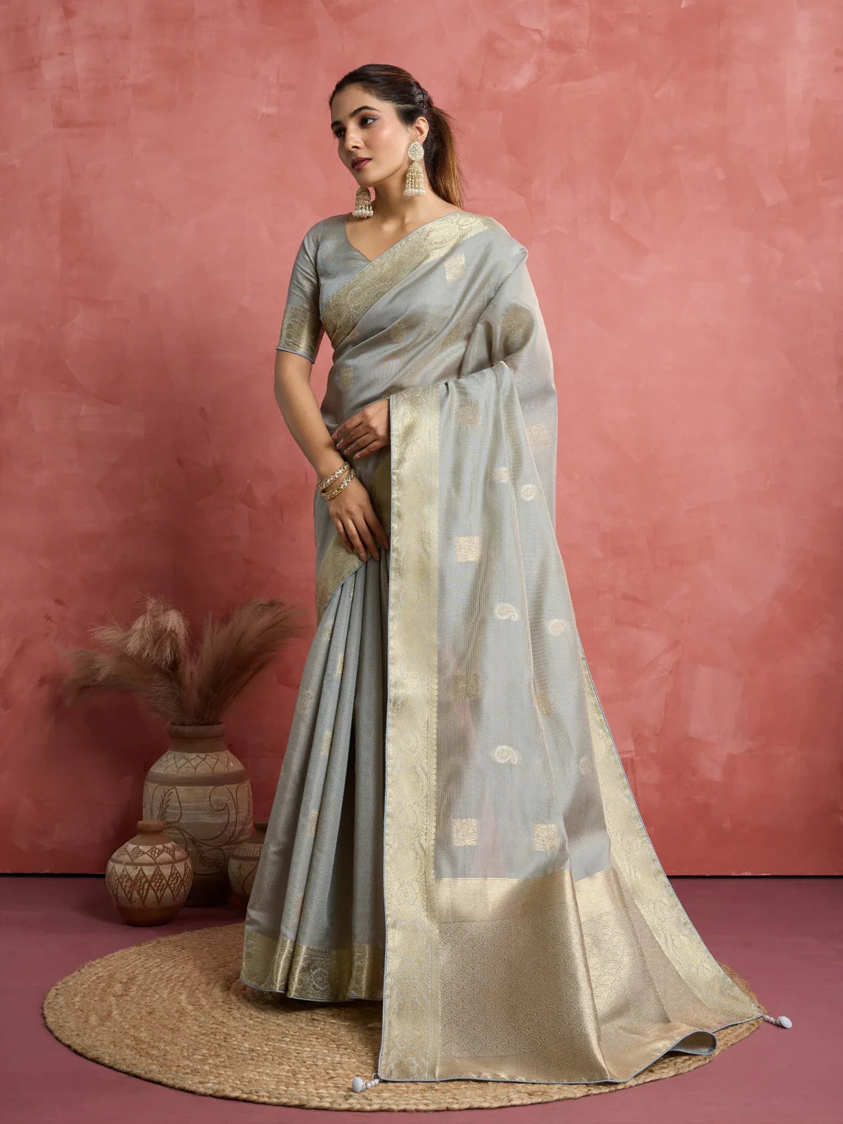 Tarani full front look of grey silk saree with woven golden border