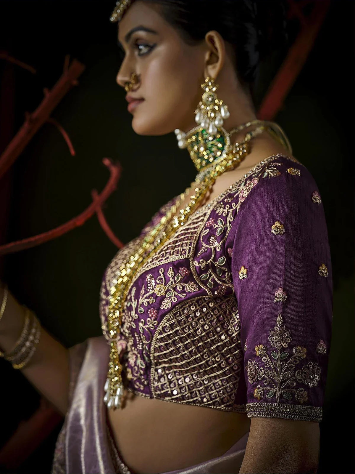 Tarani purple blouse with intricate embroidery and zarkan work paired with lavender silk saree