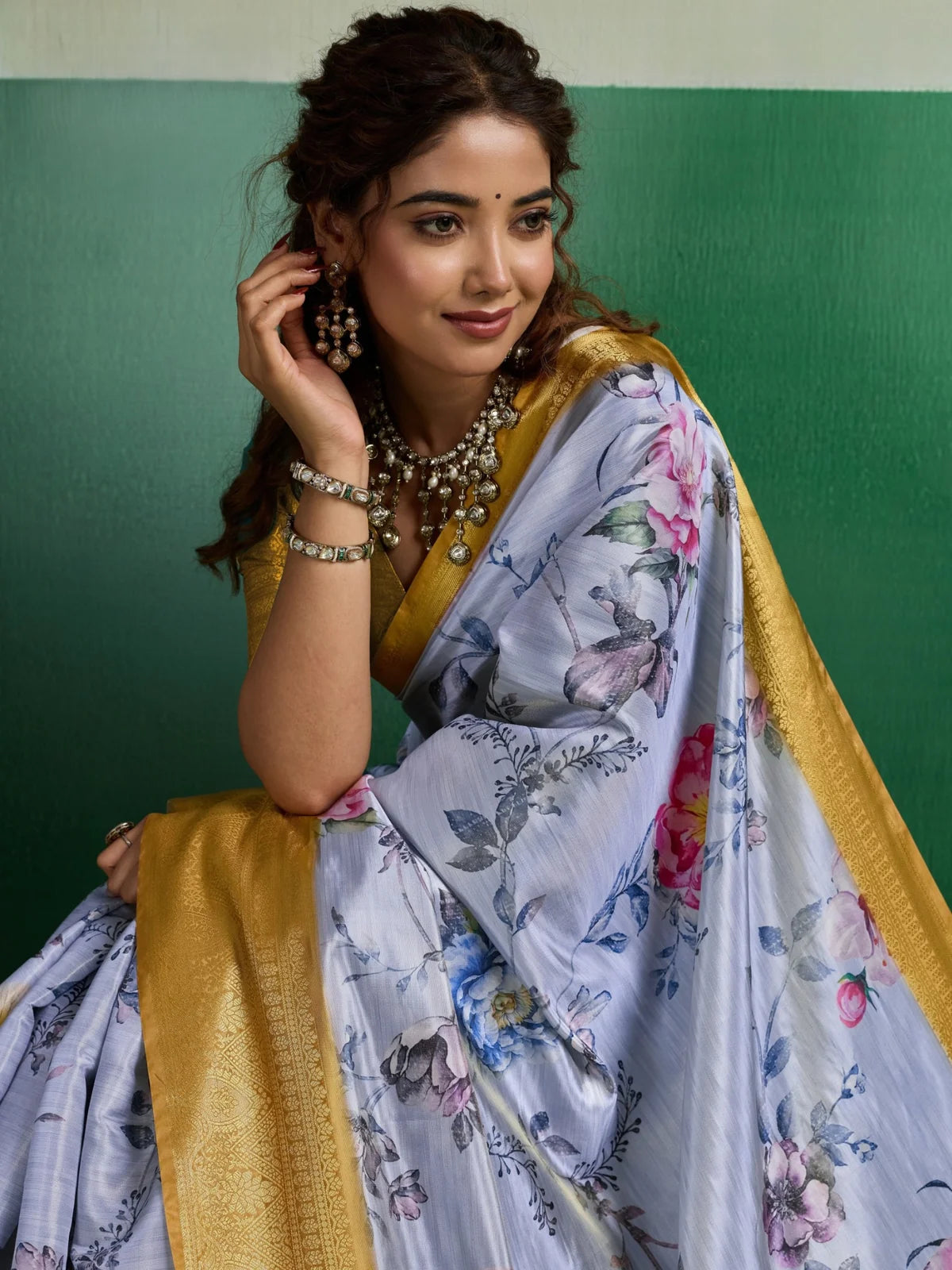 Tarani closeup floral print and zari border on tissue silk saree