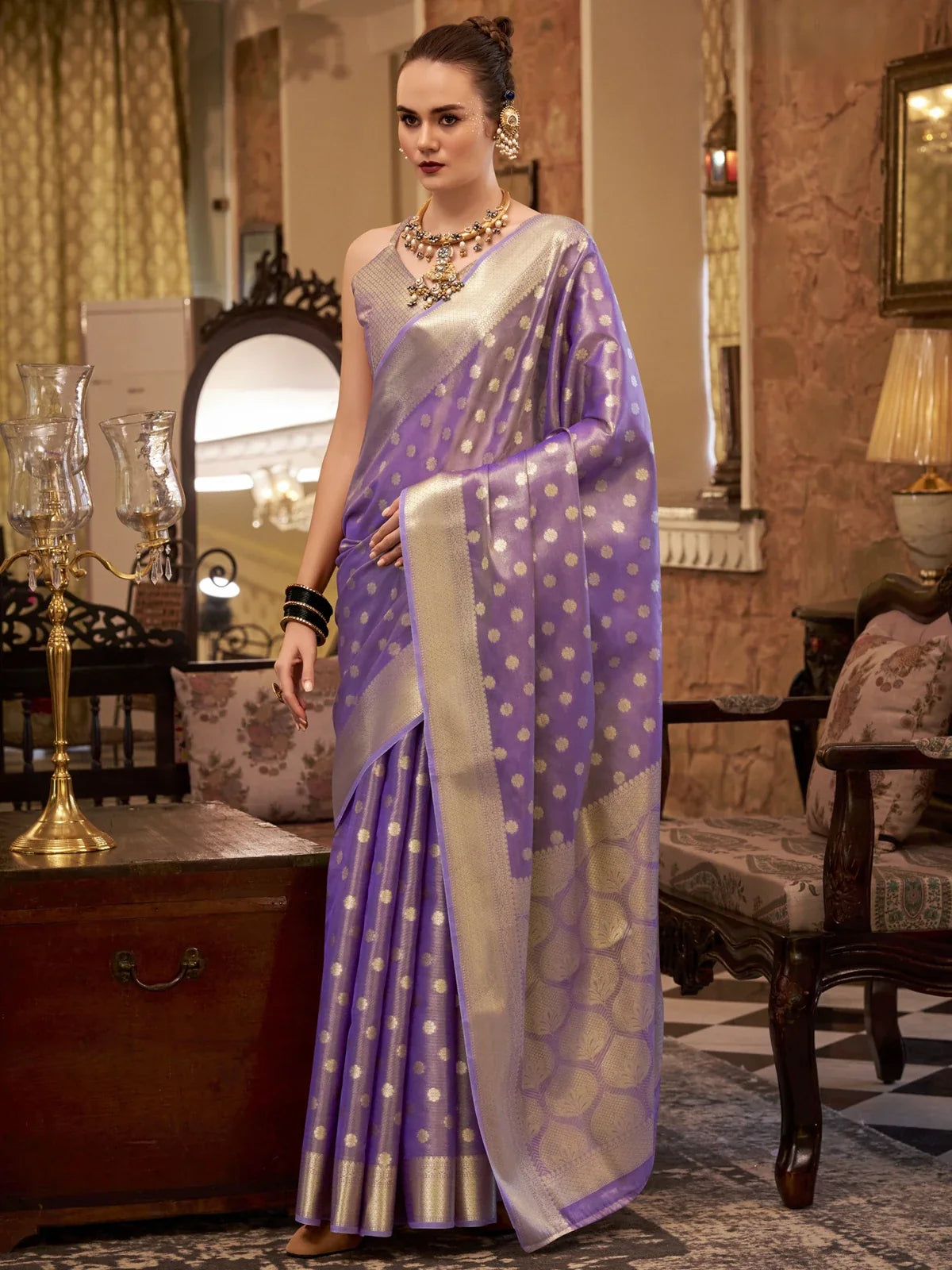 Tarani lavender zari tissue silk saree with silver butti and broad border full view with model standing