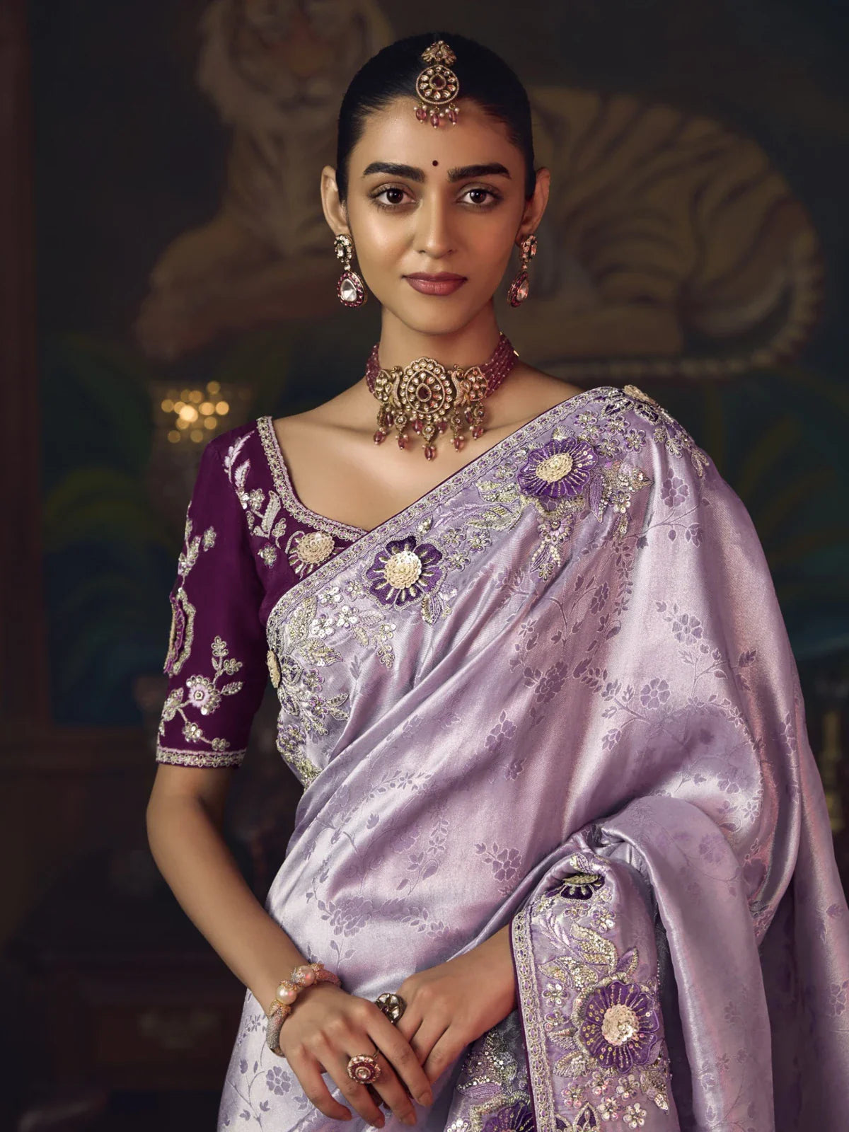 Tarani lavender silk saree upper-body closeup with contrast embroidered purple blouse