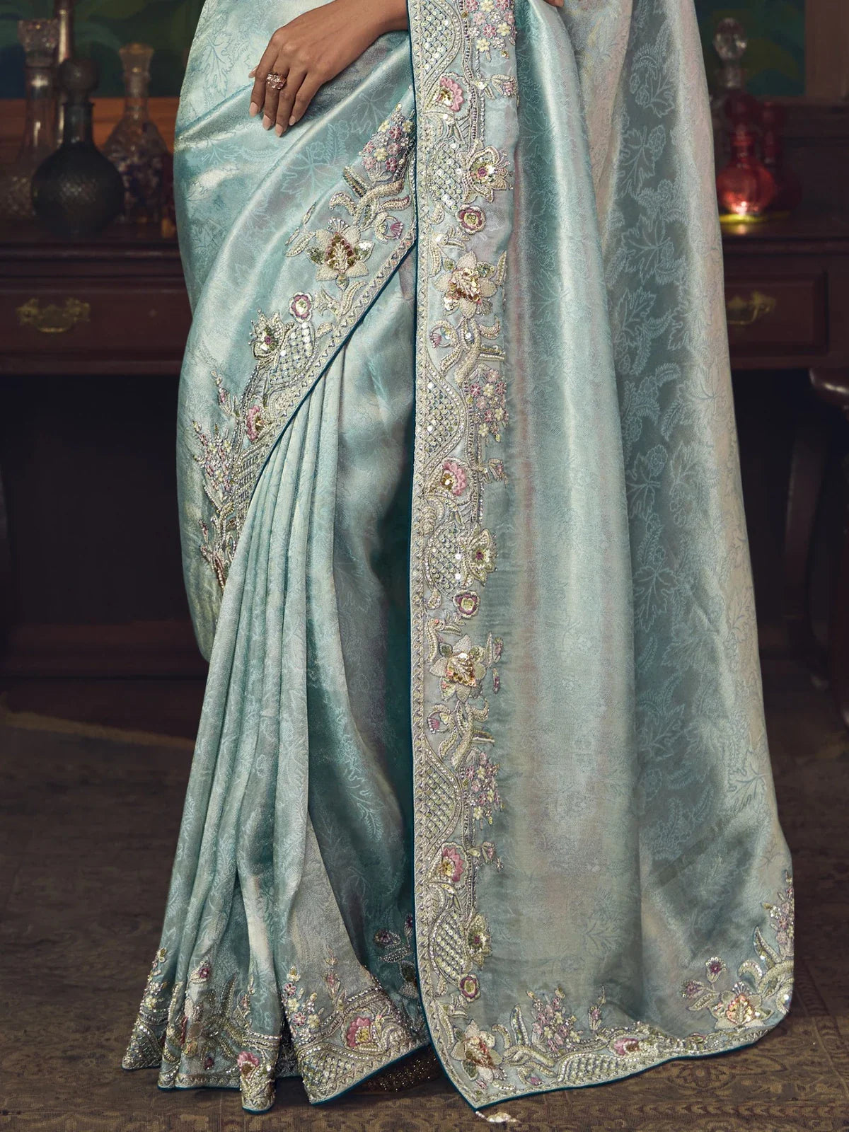 Tarani silk saree light blue pallu embroidery closeup for wedding and festive wear
