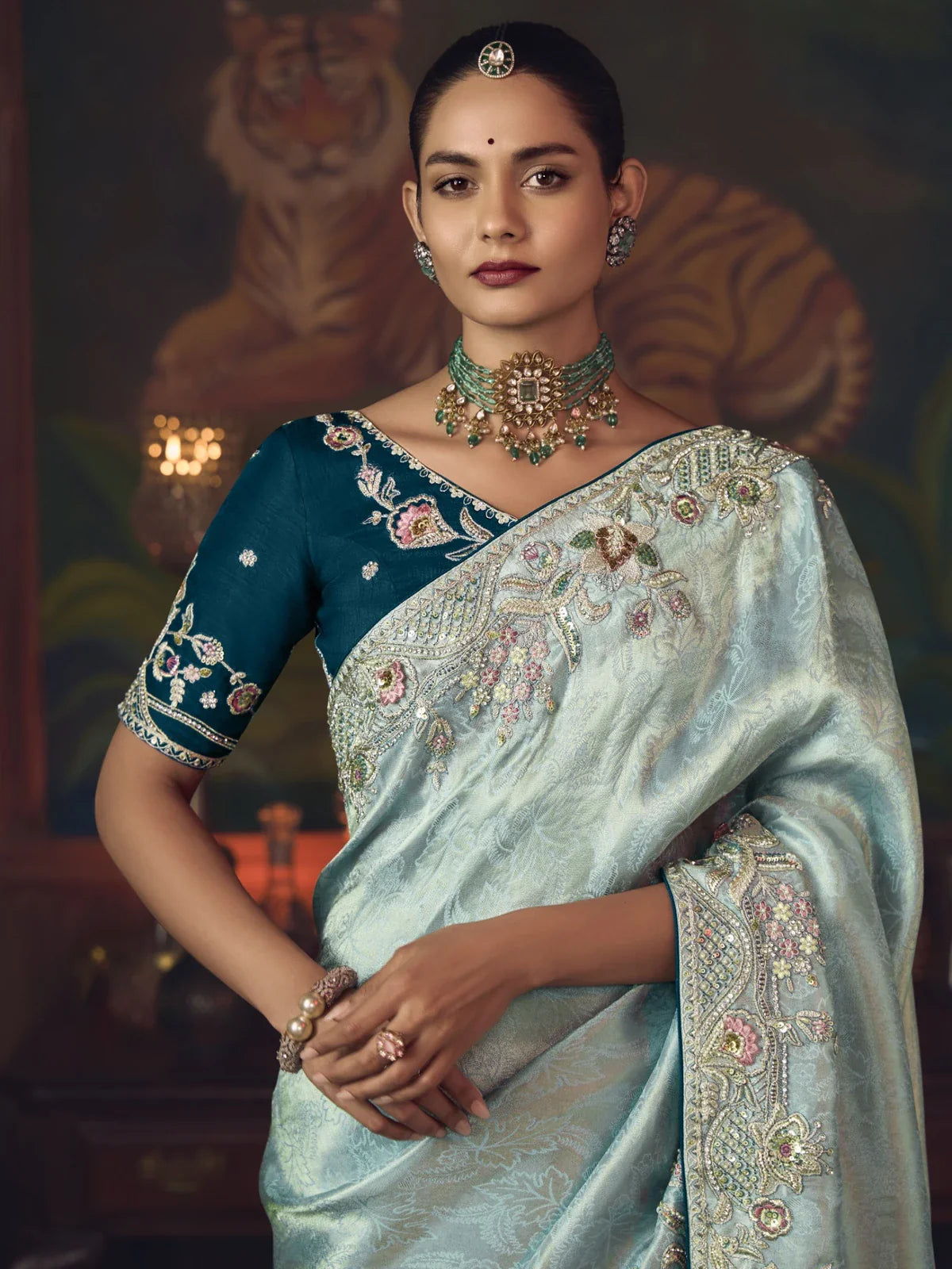 Tarani light blue silk saree with close-up view of embroidered pallu and rich blouse