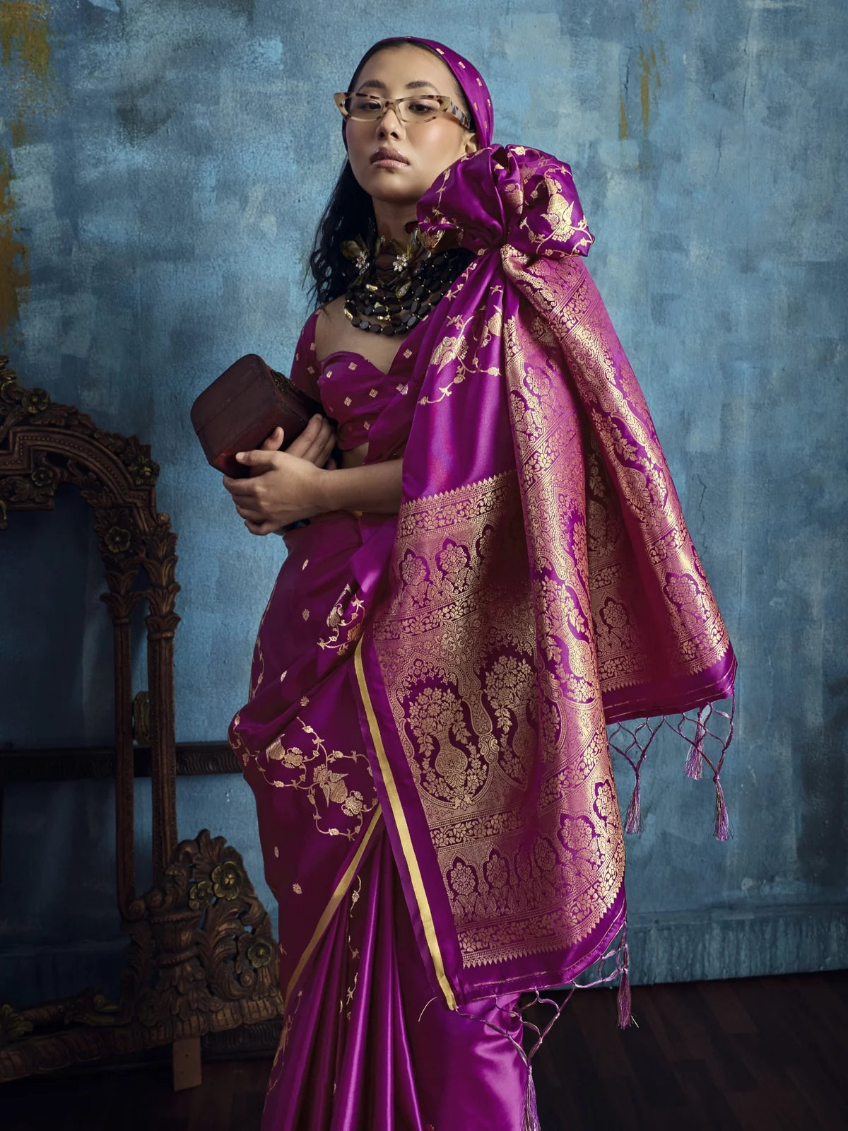 Tarani Nehal satin weaving saree pallu view with rich zari border and tassels