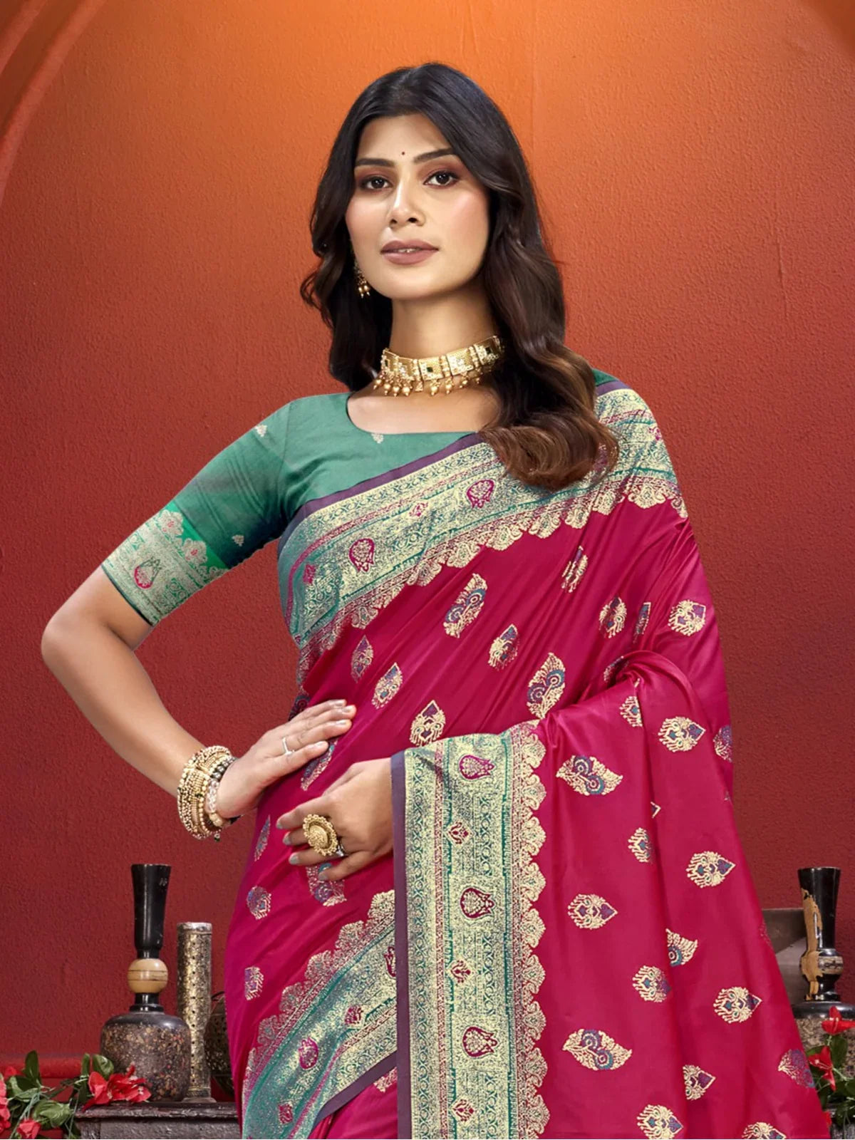 Tarani magenta silk saree upper body view with green blouse and zari border