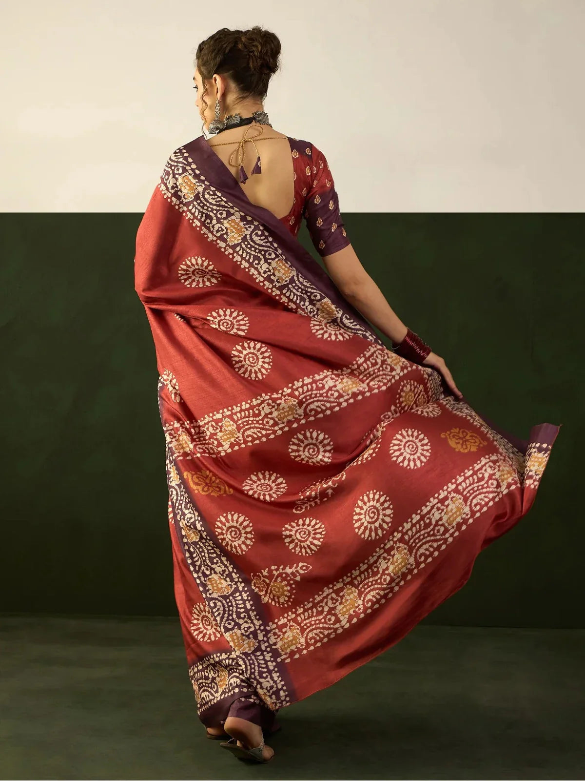 Tarani maroon silk saree back view with elegant ethnic border
