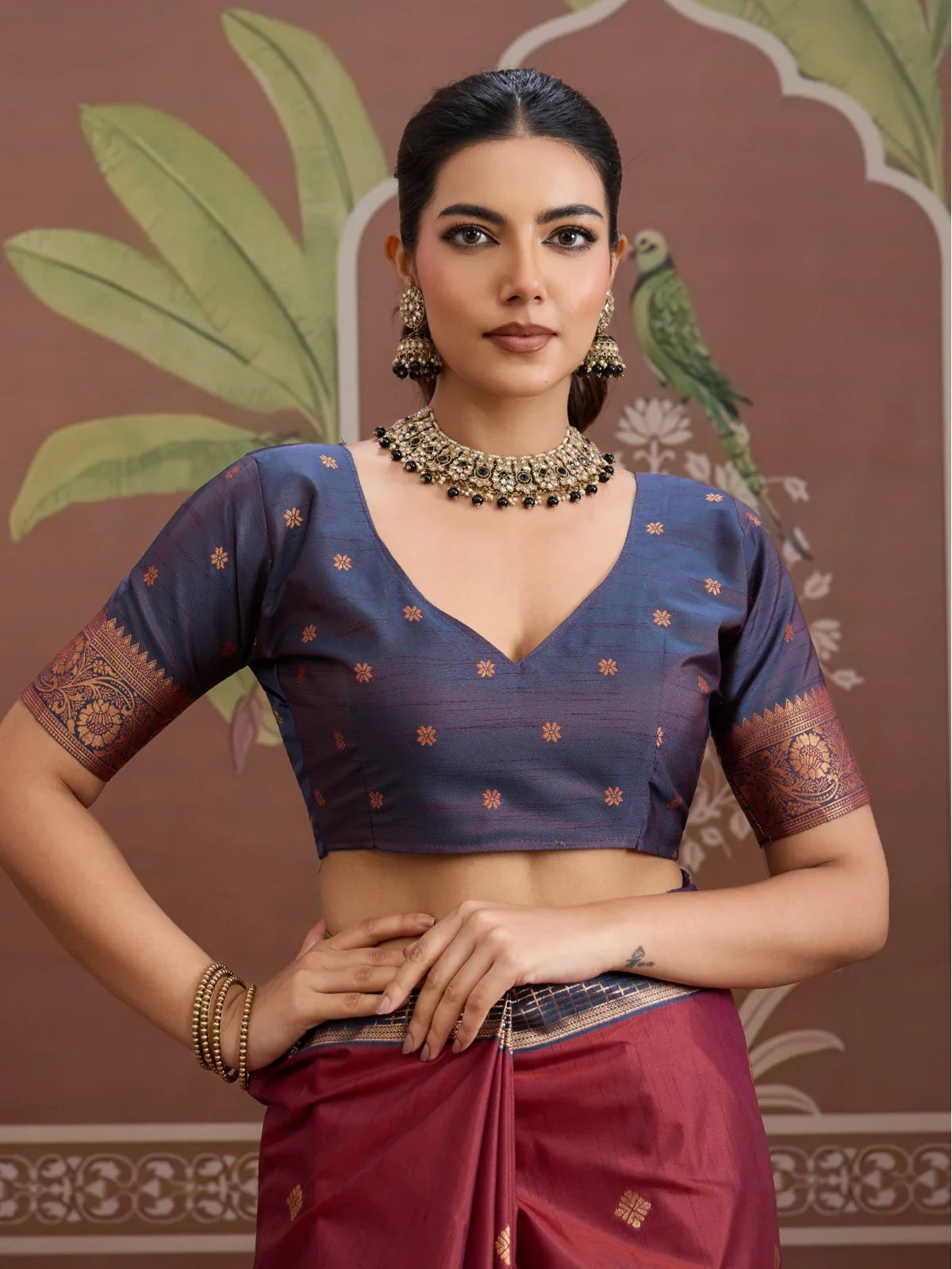 Tarani silk saree blouse close-up in deep blue with traditional golden weaving