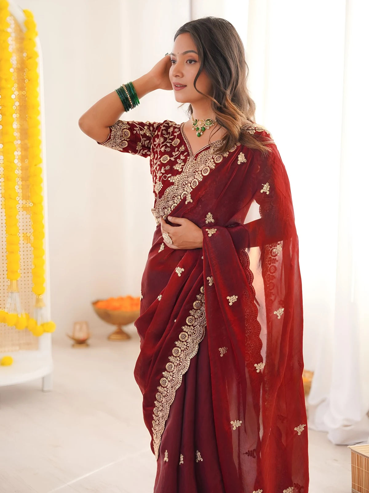 Tarani Mrunmayi maroon saree upper body pose showing embroidery blouse details