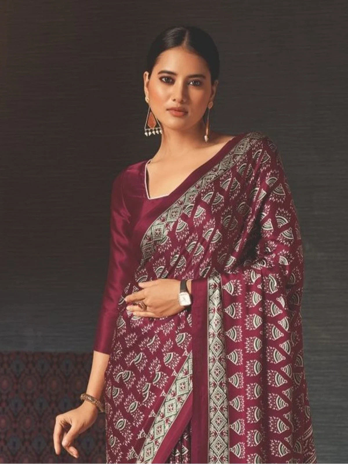 Tarani maroon silk saree upper body view highlighting blouse and drape