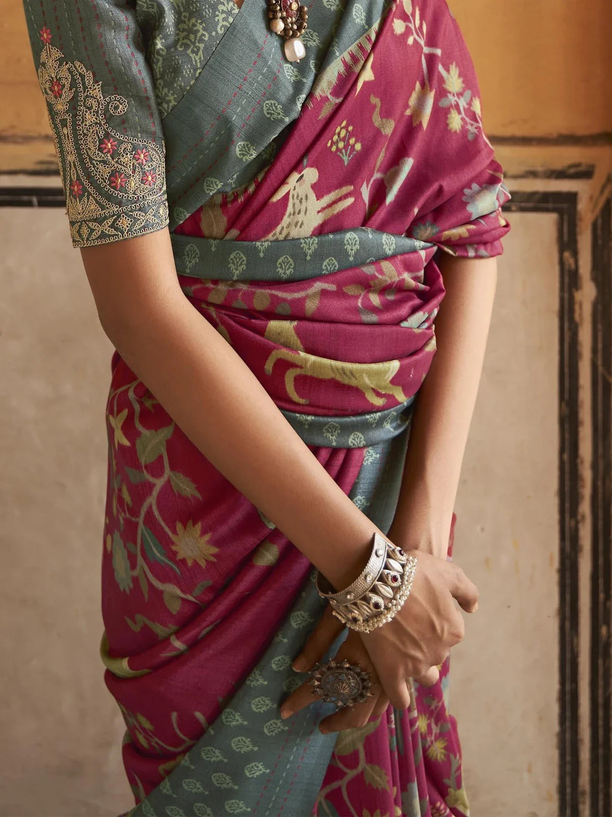 Tarani maroon tusser silk saree closeup view showing kalamkari motifs and lagdi paata work