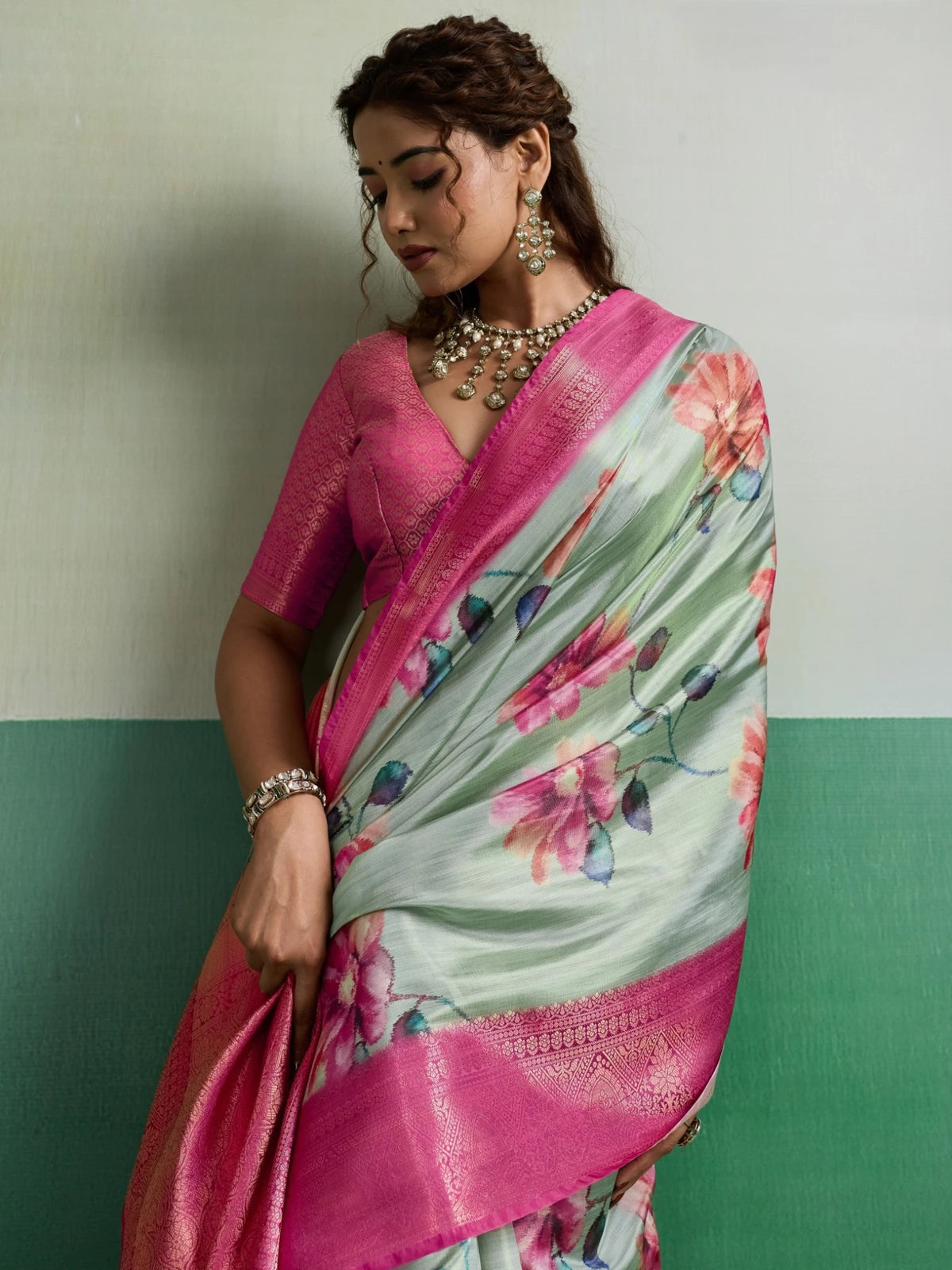 Tarani Pure Kanjivaram tissue silk saree in mint green floral print with pink border upper-body-view