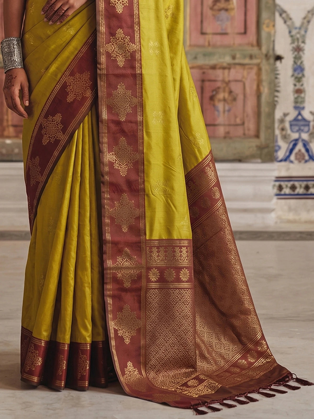 Tarani premium soft silk mustard saree with contrast border back view