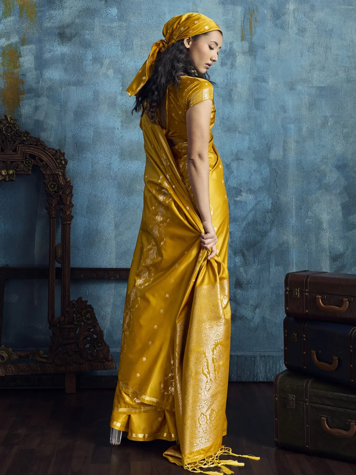 Tarani Nishika mustard satin saree back view with graceful drape and blouse design