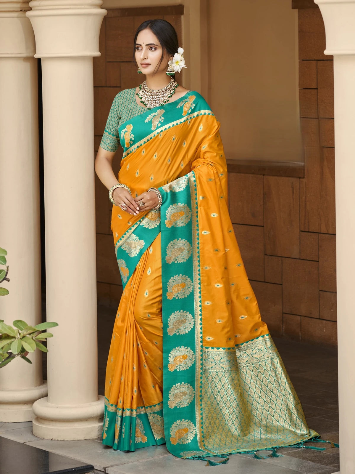 Tarani mustard silk saree with zari weaving and contrast green border full view for wedding wear