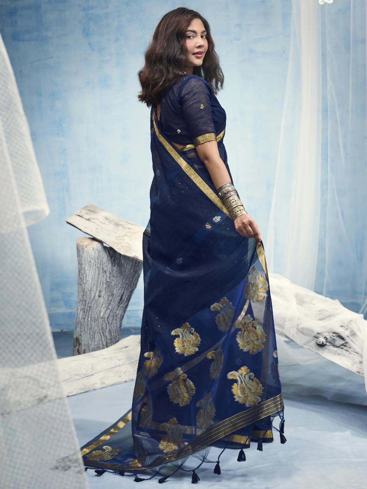 Tarani navy blue saree back view with handloom weaving