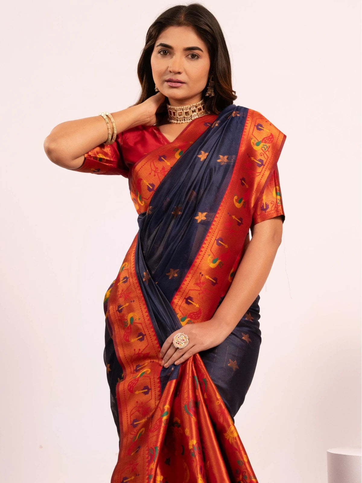 Tarani navy blue soft tissue silk Paithani saree upper body view with zari border