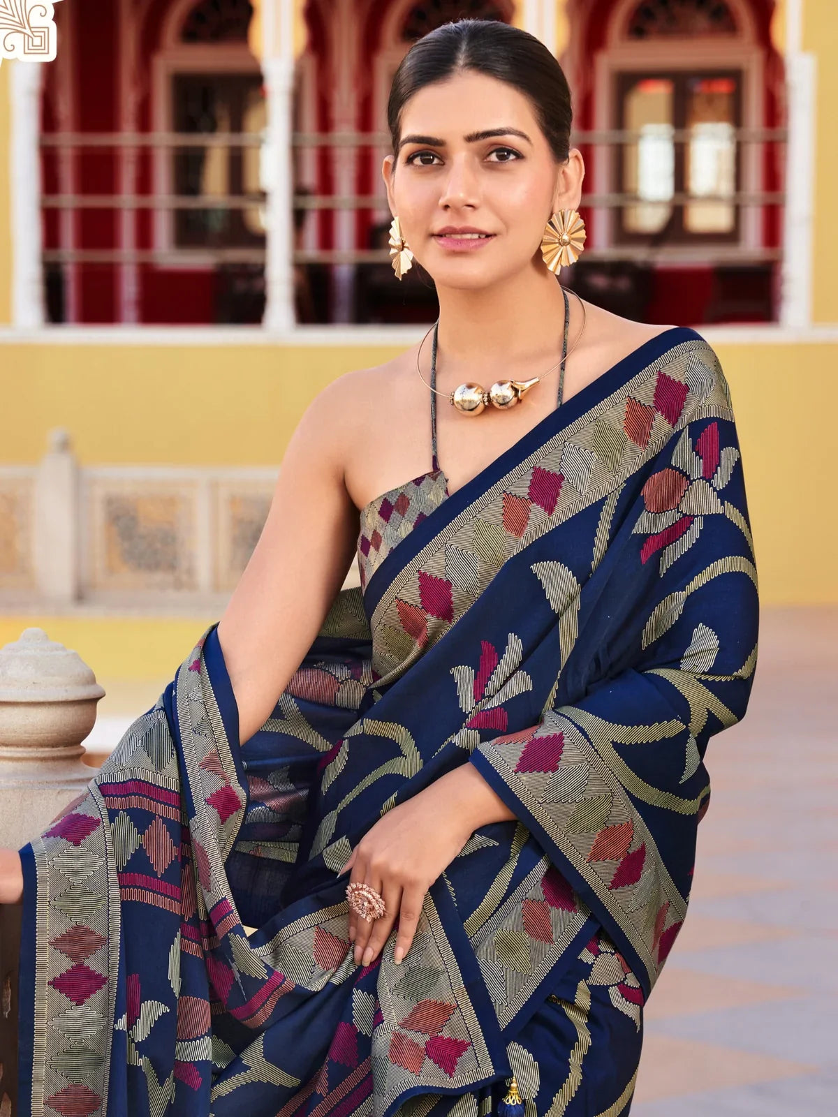 Tarani navy blue silk saree with intricate design captured in upper body pose