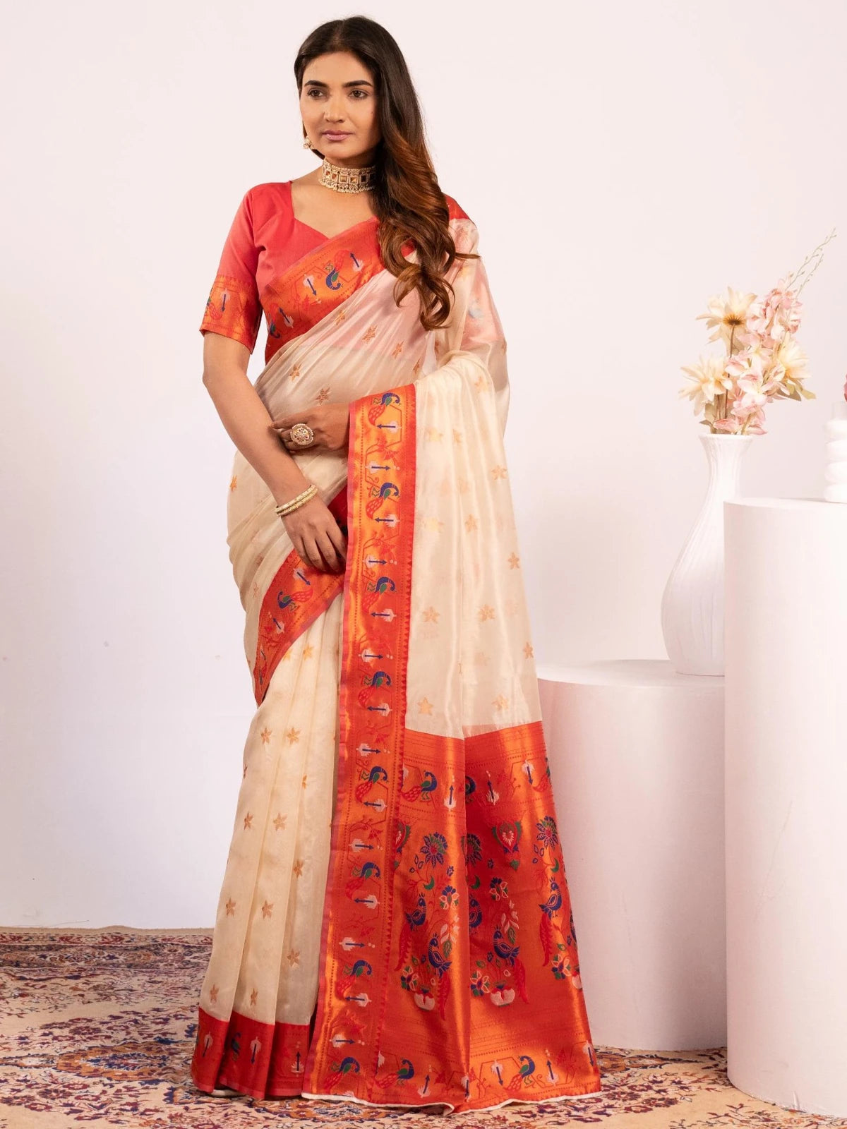 Tarani off white Paithani saree front view with floral woven butties