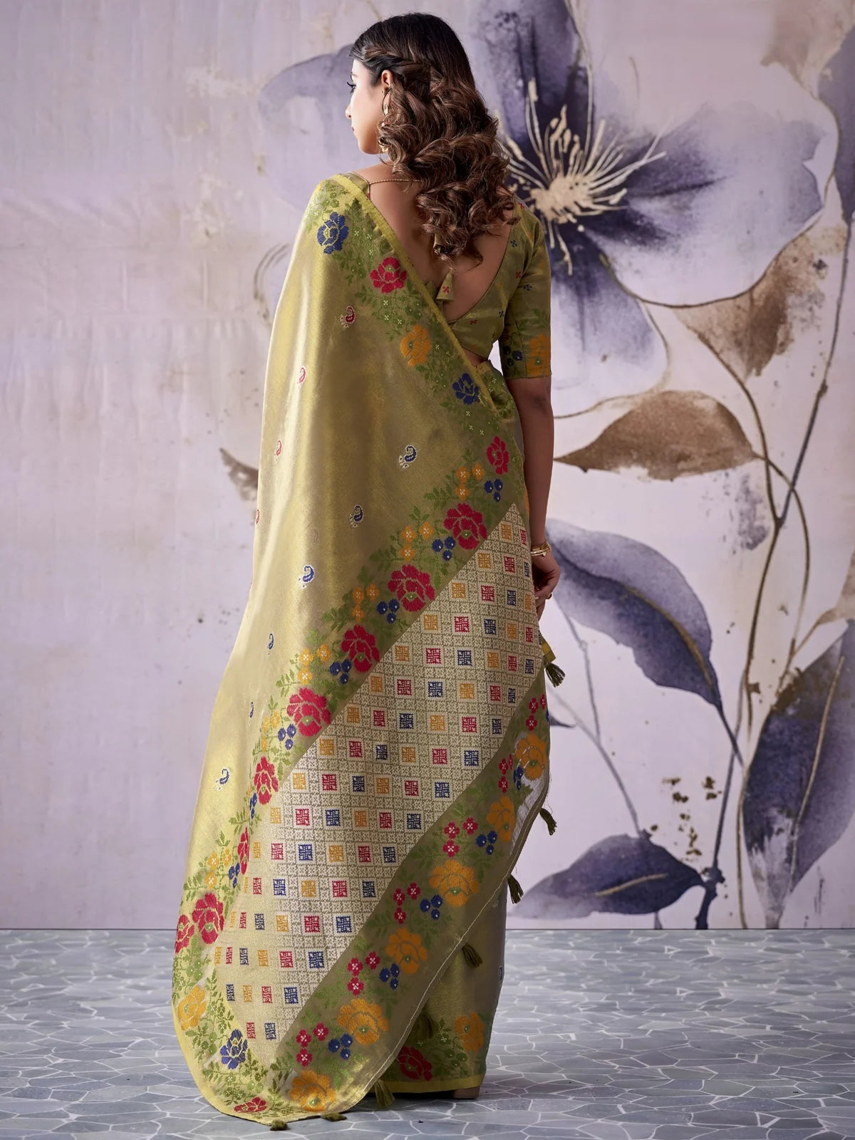 Tarani tissue silk olive saree with floral woven border back view