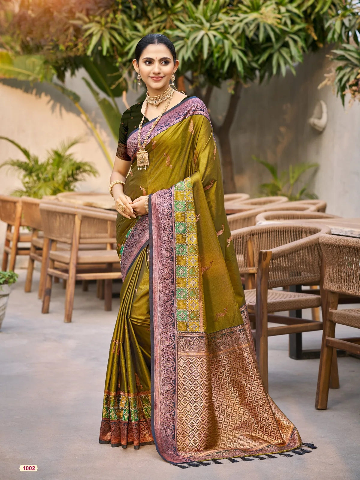 Tarani olive green soft silk saree with zari woven border full view for wedding and festive wear