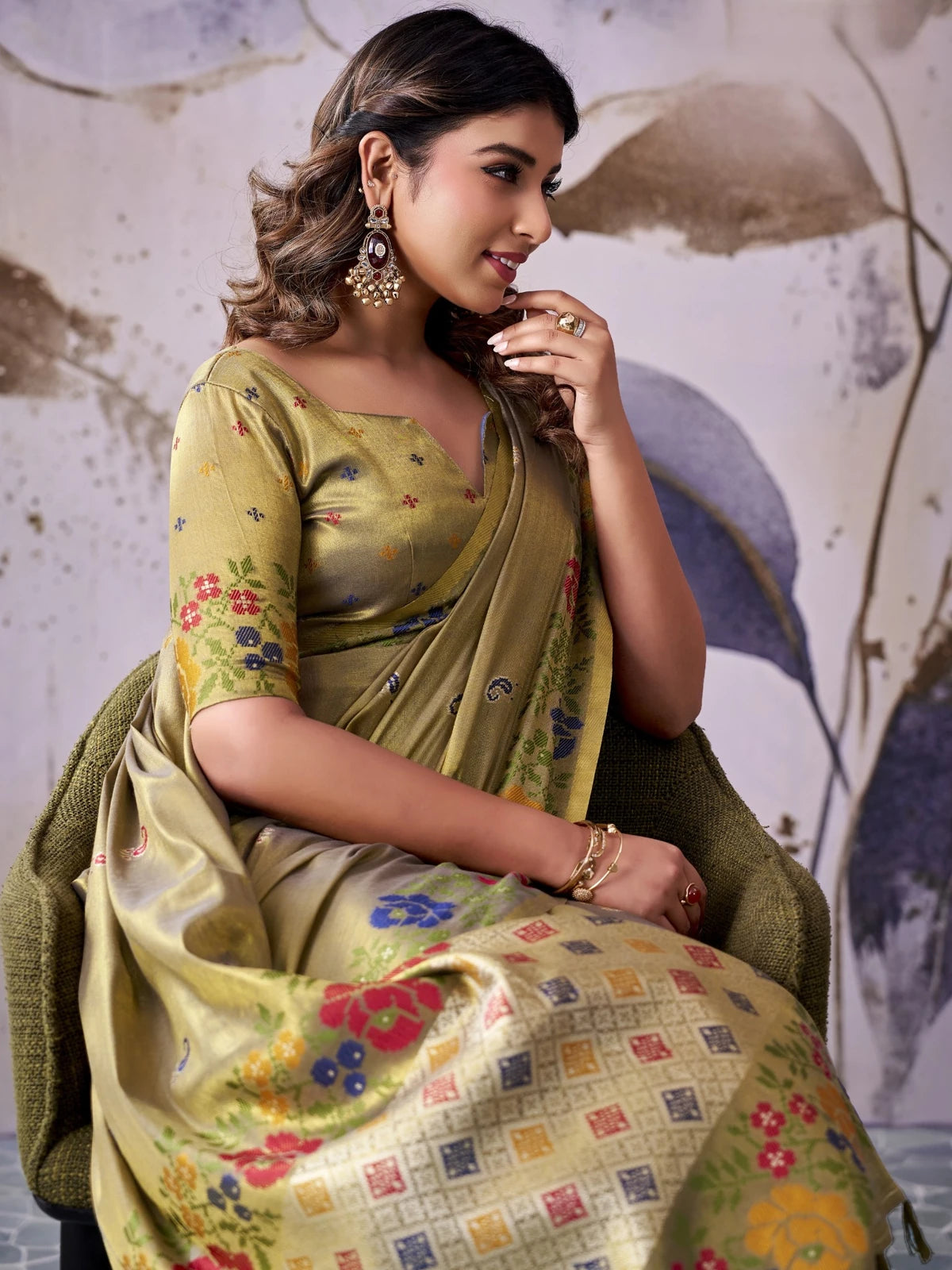 Tarani tissue silk olive saree with floral woven border side view