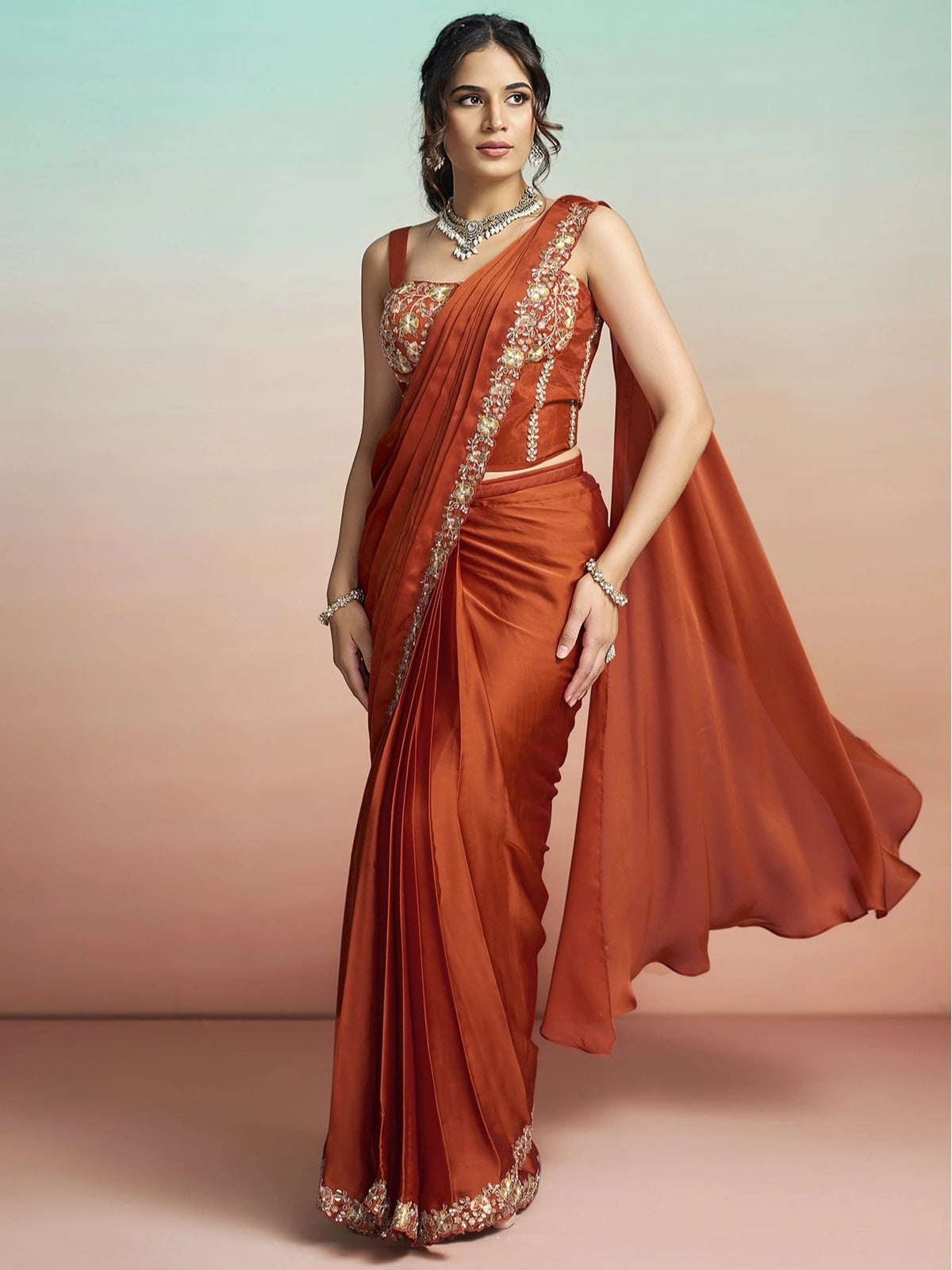 Tarani Kanta orange ready to wear satin silk saree front view with embellished border and blouse