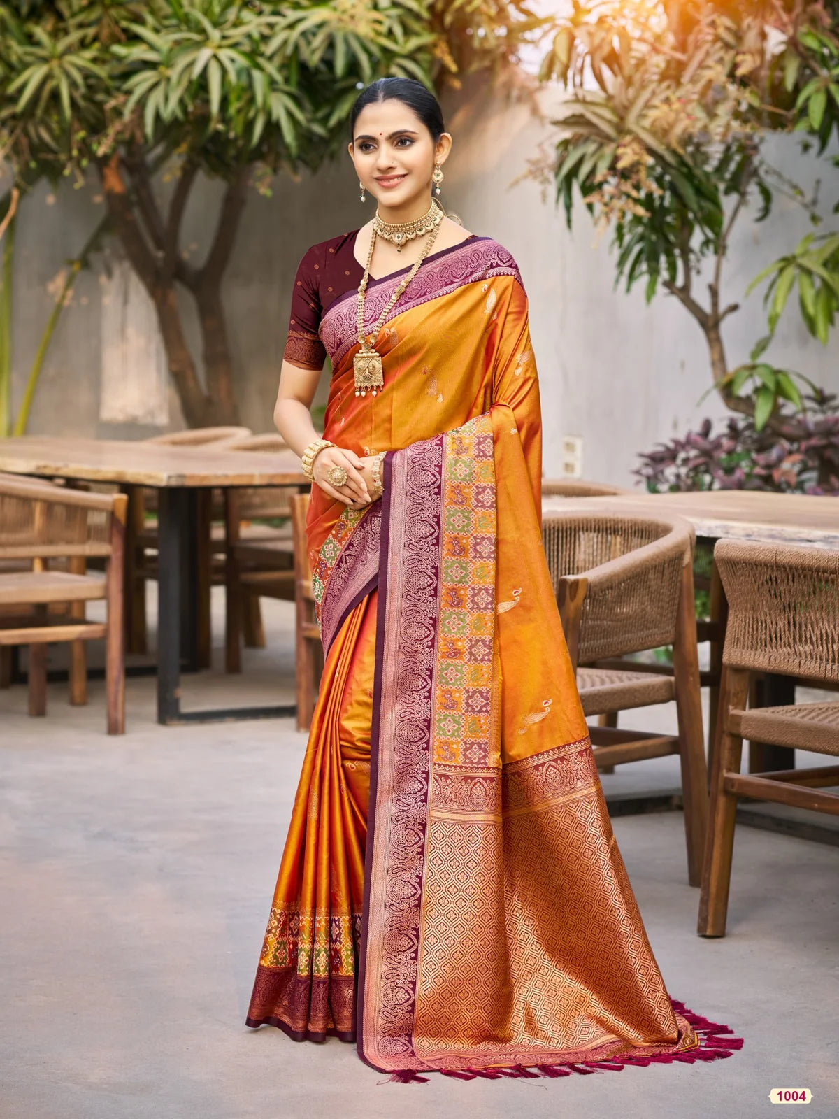 Tarani orange soft silk saree with woven zari border full view for festive and wedding wear