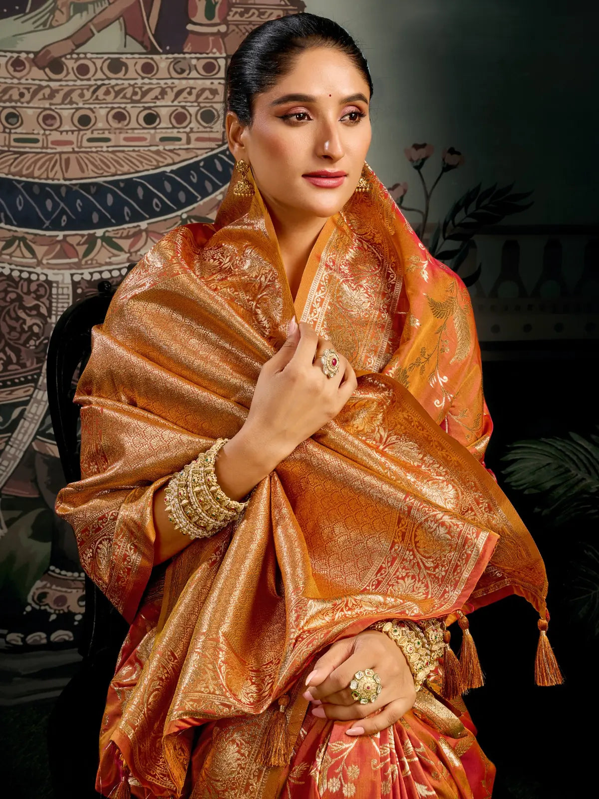Tarani orange silk saree pallu detailing view