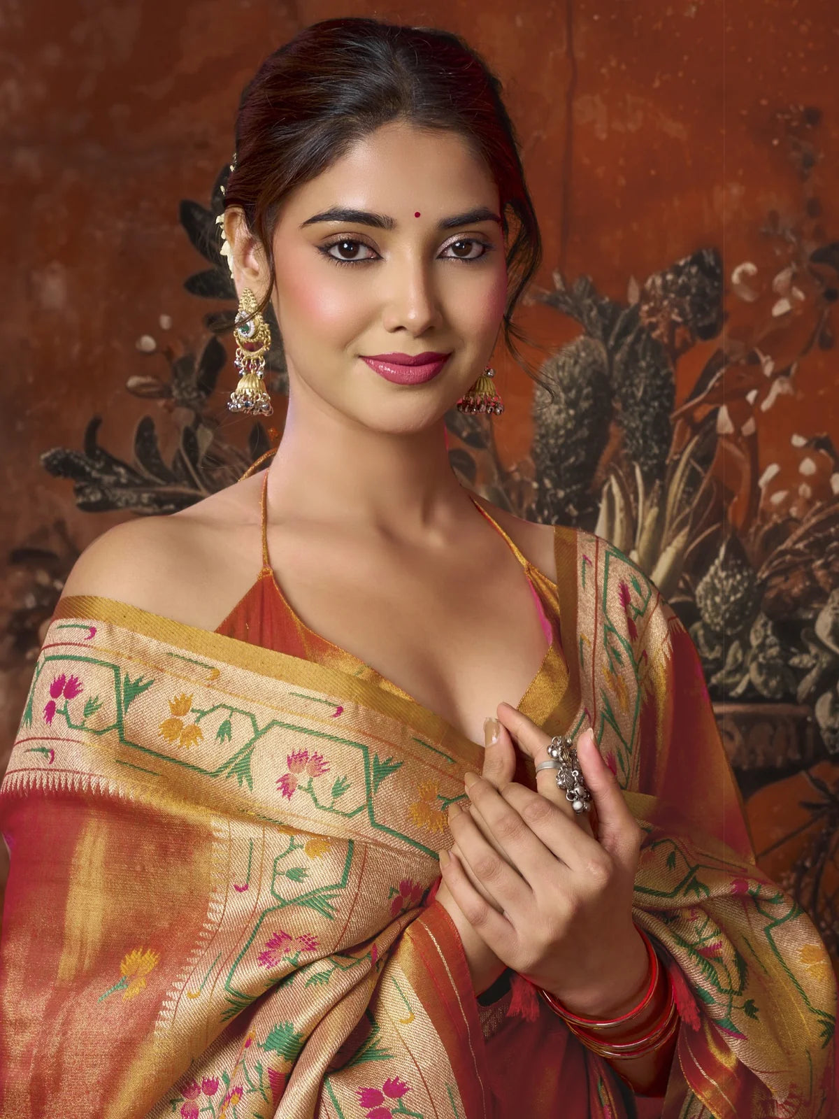 Tarani premium tissue silk orange Paithani saree upper body view with elegant border