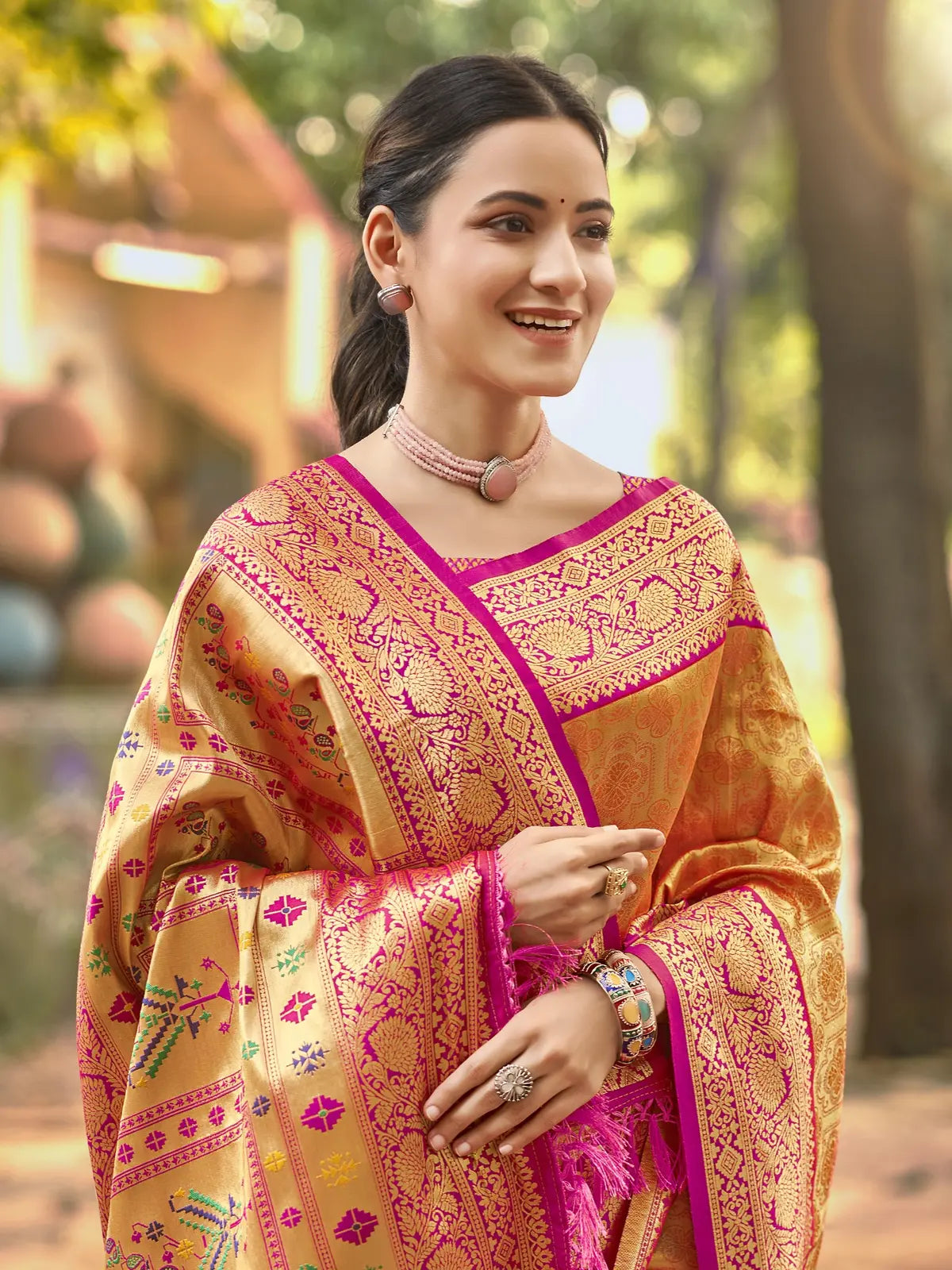 Tarani orange Kanjivaram silk saree upper body styling with blouse