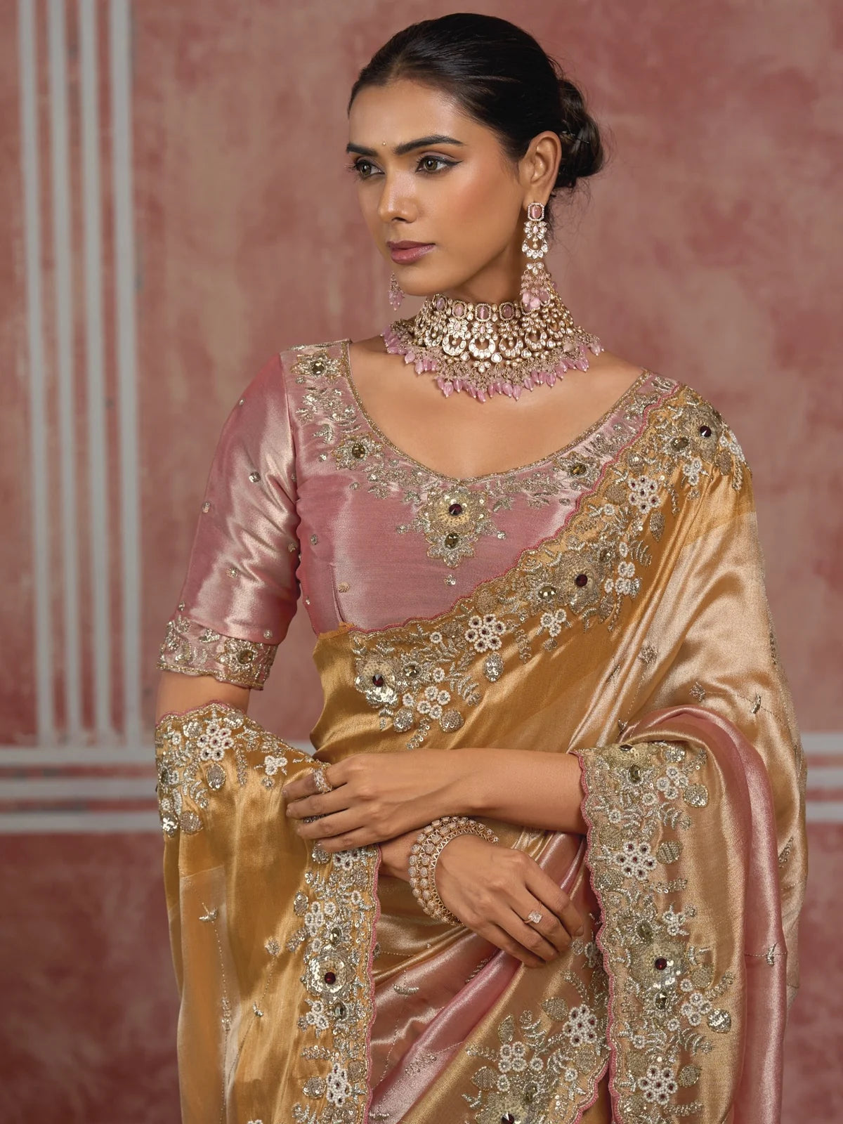 Tarani Pure Ziraf Silk peach saree upper body view highlighting blouse and border embroidery